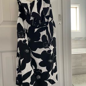 Strapless Express dress with small slit in the back.